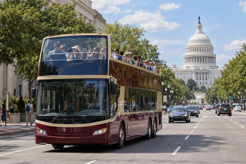 Open-top sightseeing bus in Washington DC with the US Capitol in the background