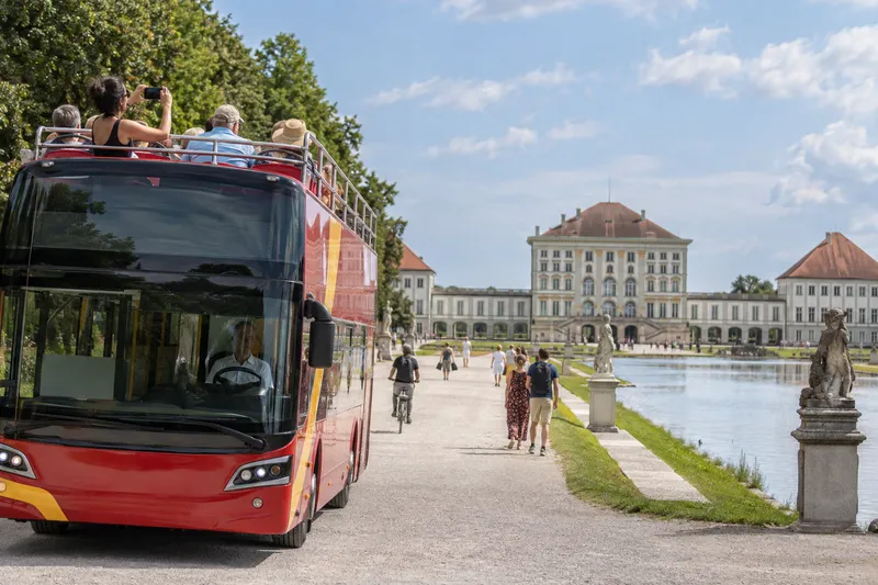 Open-top sightseeing bus at Nymphenburg Palace in Munich